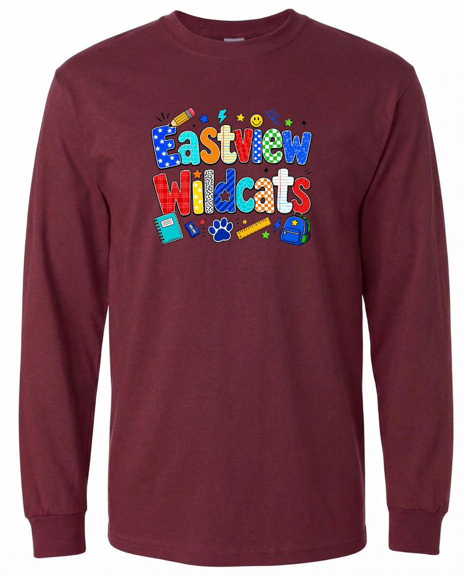 A burgundy long-sleeved t-shirt with a colorful graphic design featuring the text "Eastview Wildcats" surrounded by various school-related icons and objects.
