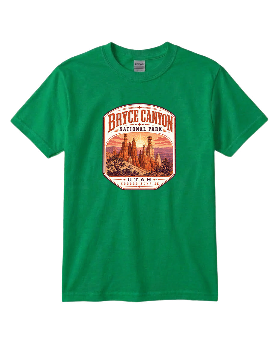 A green t-shirt with a graphic design depicting the Bryce Canyon National Park in Utah.