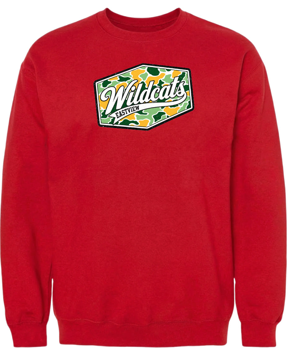 A red sweatshirt with a graphic design featuring the word "Wildcats" in a stylized font.