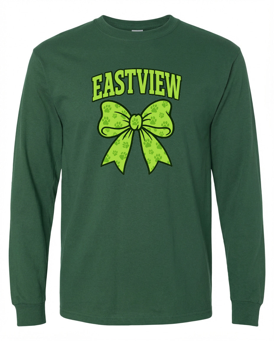 A green long-sleeved t-shirt with a graphic design featuring a large green bow and paw prints.