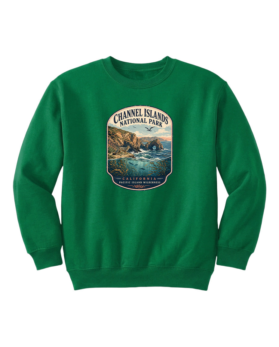 A green sweatshirt with a graphic design depicting a scenic coastal landscape, including cliffs, water, and a sunset.