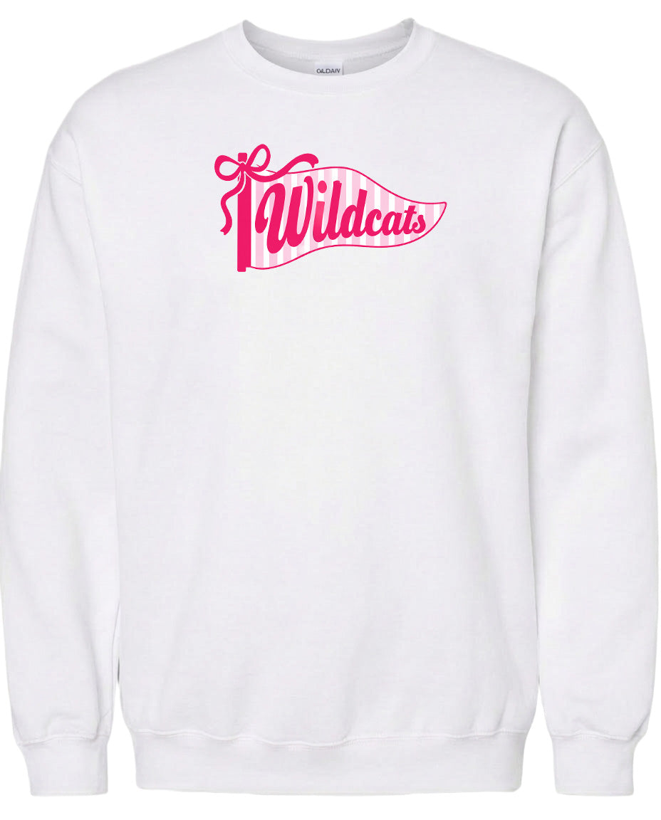 A white sweatshirt with a pink and white banner design featuring the word "Wildcats" printed on it.