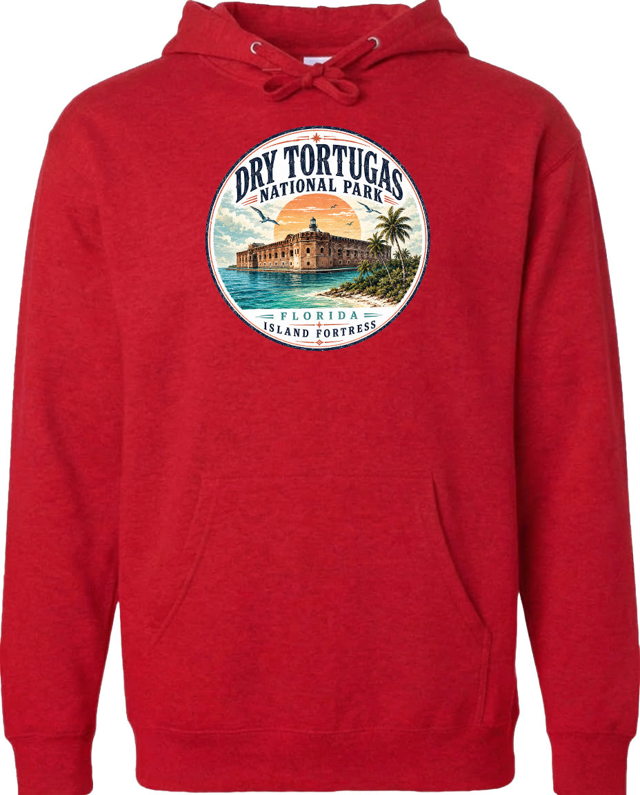 A red hoodie with a circular design featuring a tropical island and a building, along with the text "Dry Tortugas National Park, Florida Island Fortress".