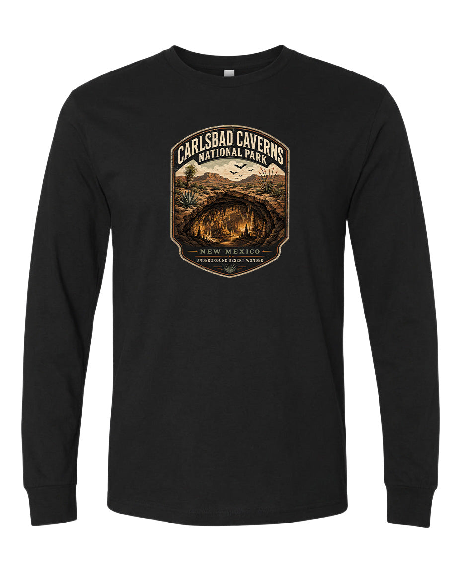A black long-sleeve t-shirt with a graphic design depicting the Carlsbad Caverns National Park in New Mexico.