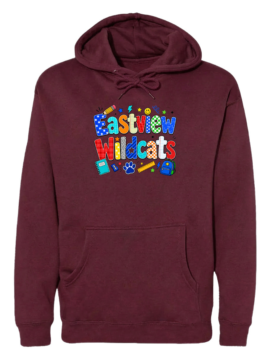 A burgundy hoodie with a colorful graphic design featuring the text "Eastview Wildcats" and various school supplies such as a backpack, pencil, and book.