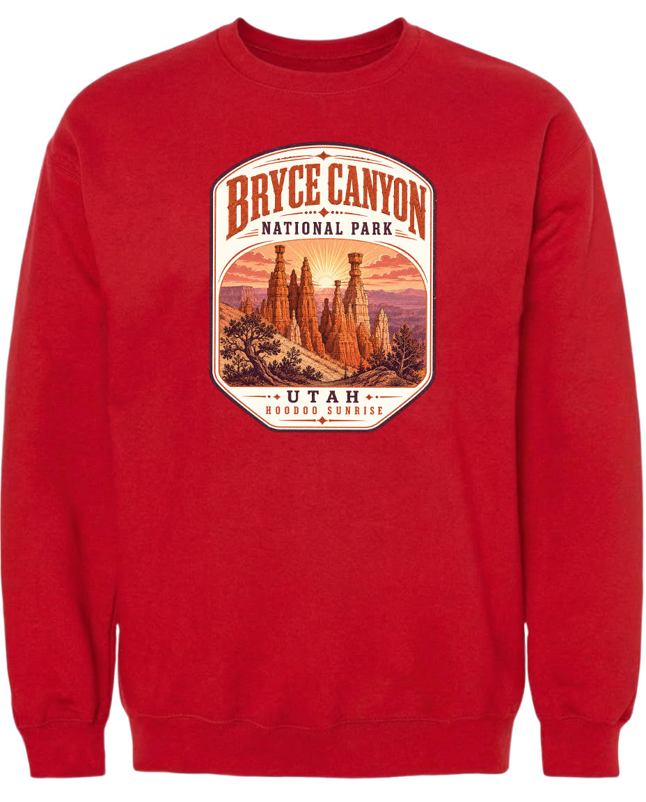 A red sweatshirt with a graphic design depicting the Bryce Canyon National Park in Utah.