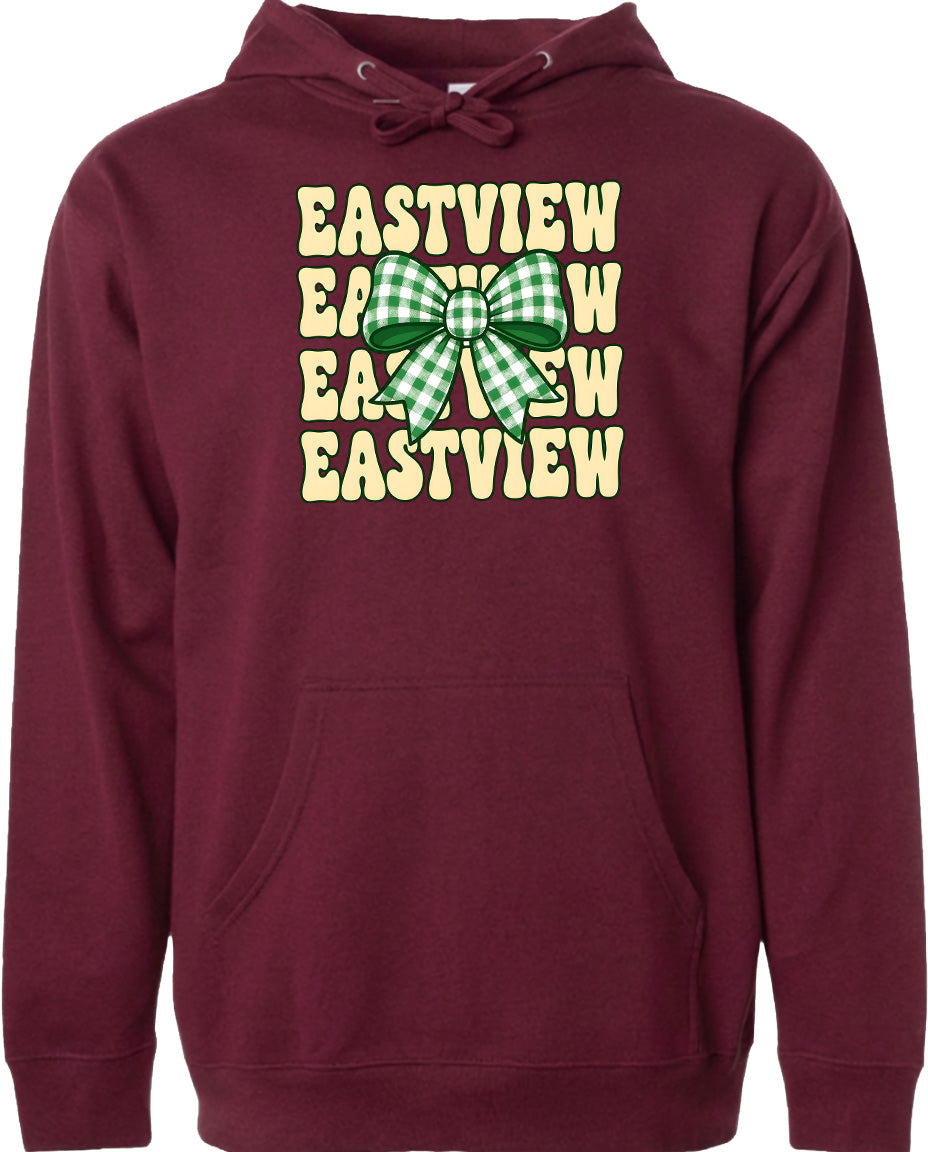 A burgundy-colored hoodie with a graphic design on the front. The design features a green and white checkered bow and the text "EASTVIEW" repeated in a vertical arrangement.