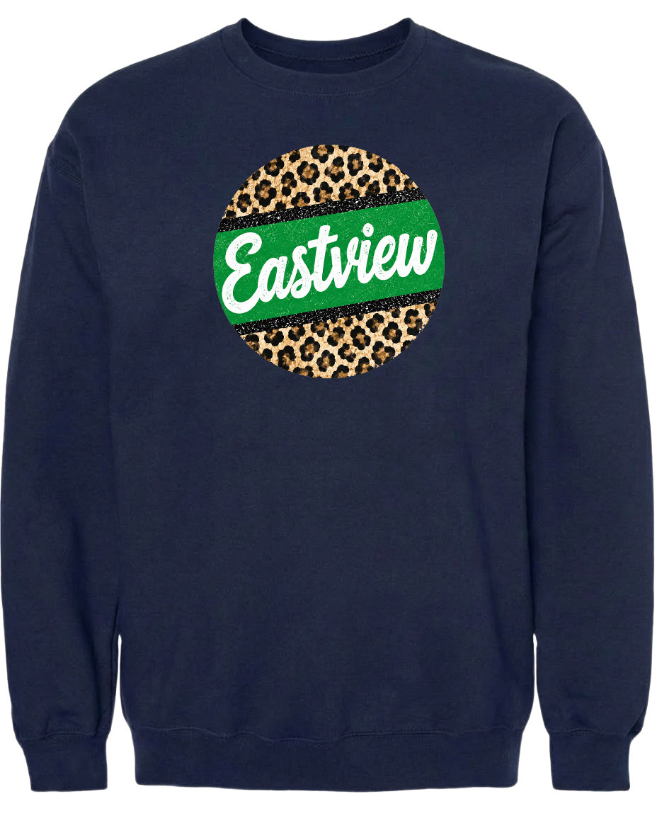 A navy blue sweatshirt with a circular logo on the front. The logo features a leopard print design with a green stripe around it, and the word "Eastview" written in white cursive letters.