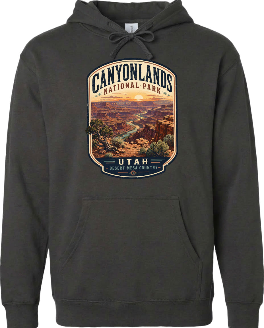 A hoodie with a graphic design depicting the scenic landscape of Canyonlands National Park in Utah.