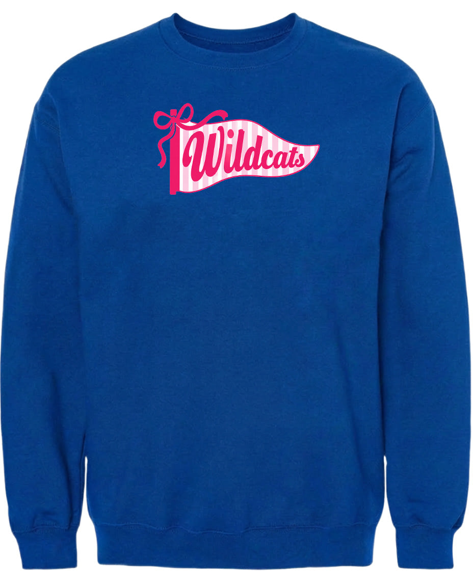 A blue sweatshirt with a pink and white banner that says "Wildcats".