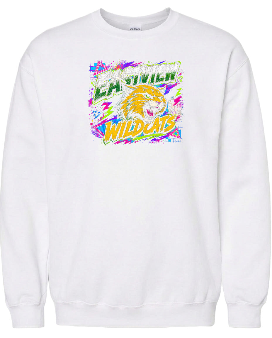 A white sweatshirt with a graphic design featuring a yellow and orange tiger's head surrounded by colorful, abstract shapes and text.