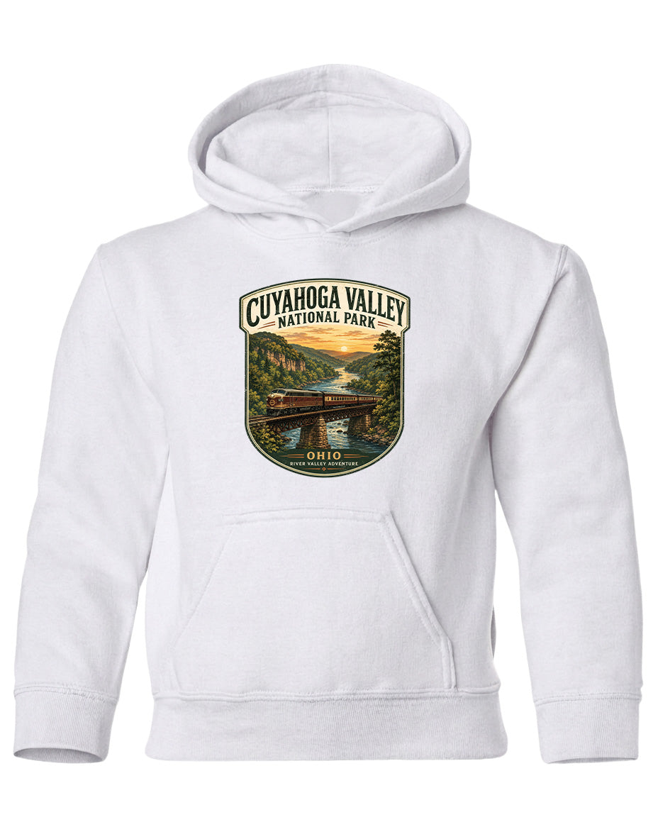 A white hoodie with a graphic design depicting a scenic view of Cuyahoga Valley National Park, featuring a bridge and a river.