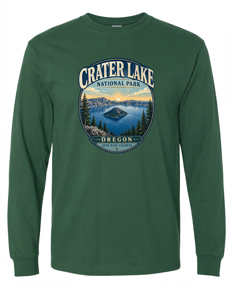 A green long-sleeved t-shirt with a graphic design featuring a scenic landscape with a lake, mountains, and trees.
