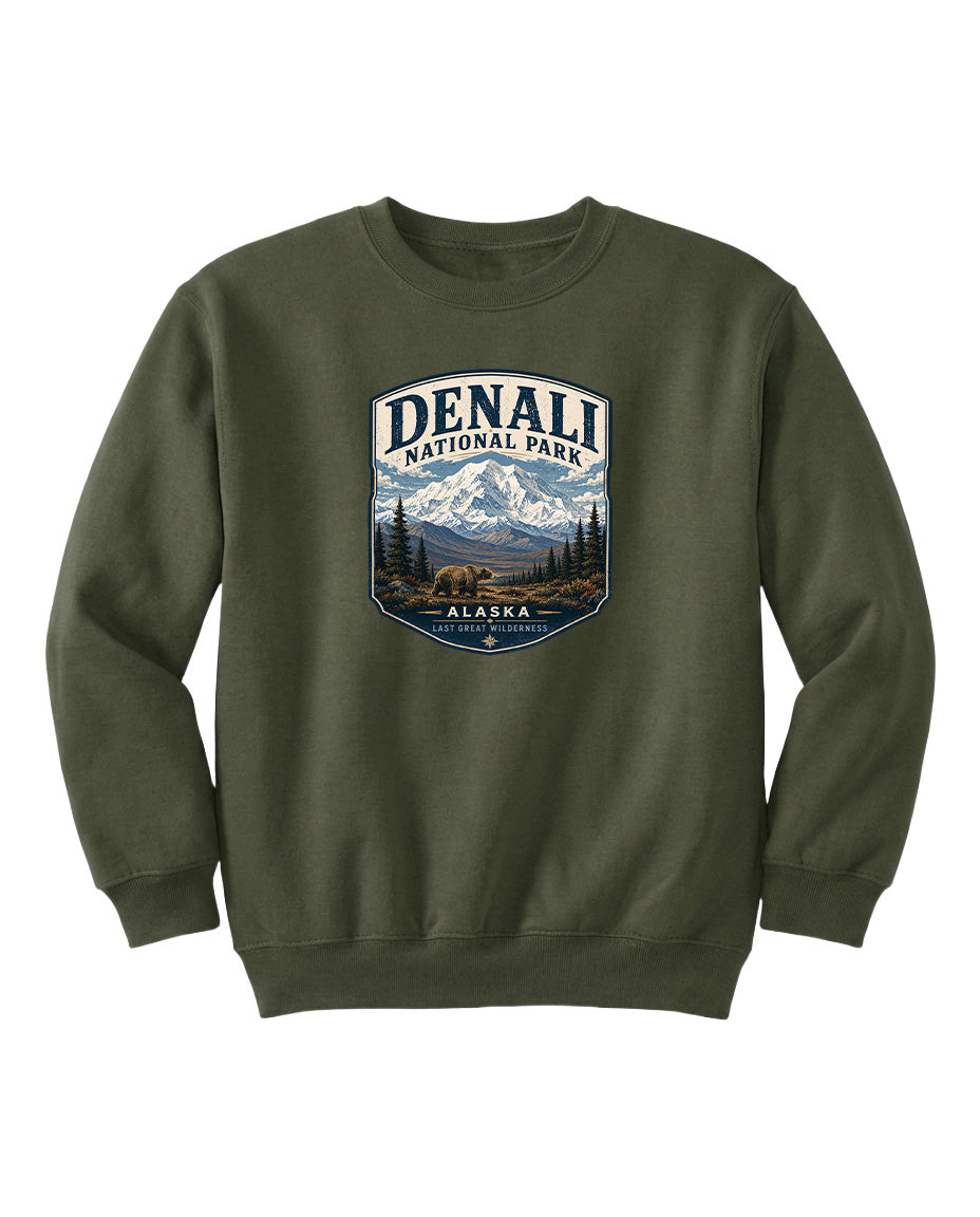 A green sweatshirt with a graphic design featuring a mountain landscape and bears, along with the text "DENALI NATIONAL PARK ALASKA".