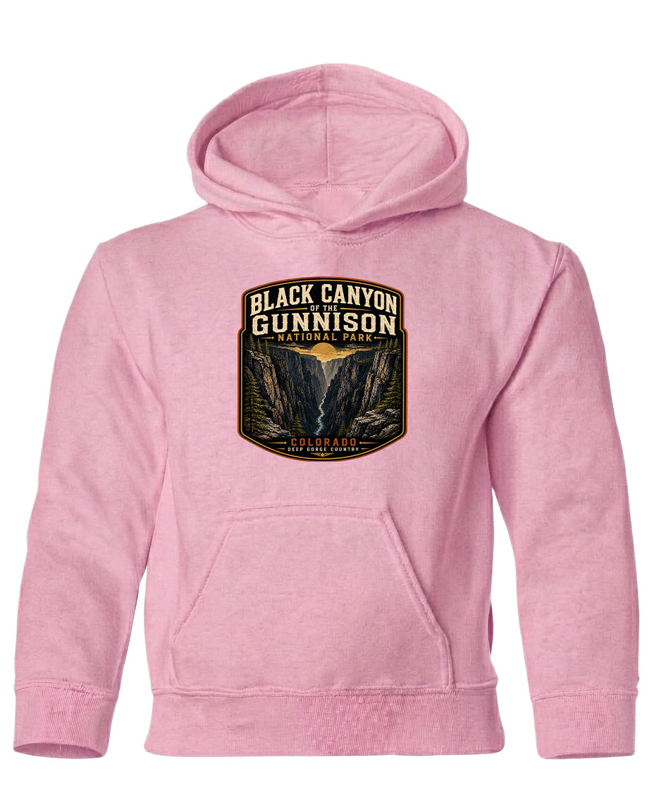 A pink hoodie with a graphic design depicting the Black Canyon of the Gunnison National Park.