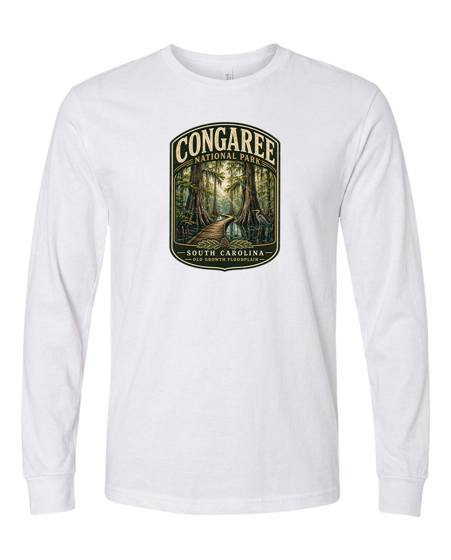 A white long-sleeved t-shirt with a graphic design depicting a forest scene with a path leading through it.