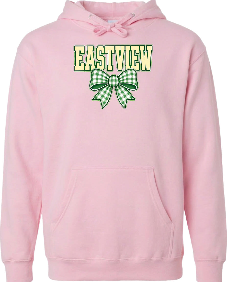 A pink hoodie with a green and white bow on the front.