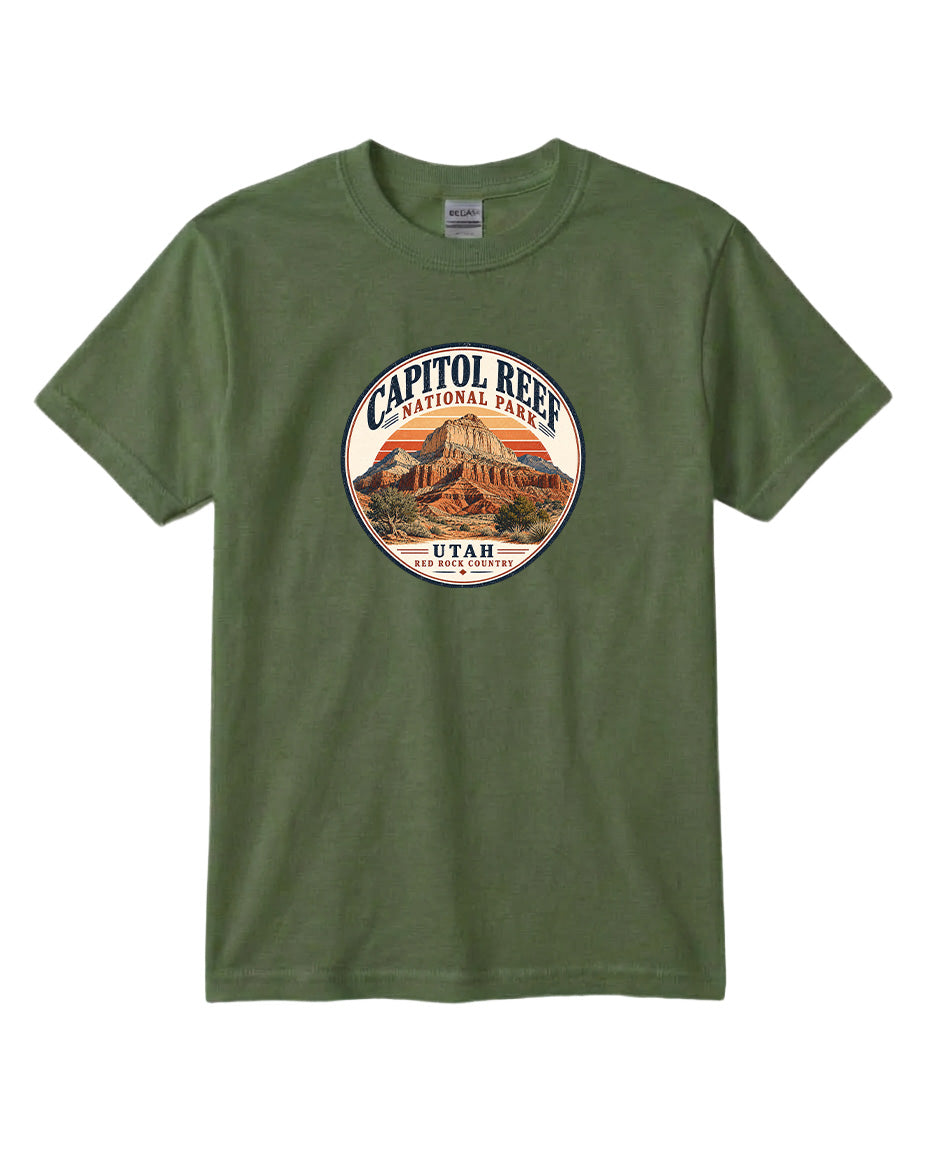 A green t-shirt with a circular graphic design featuring the Capitol Reef National Park in Utah.