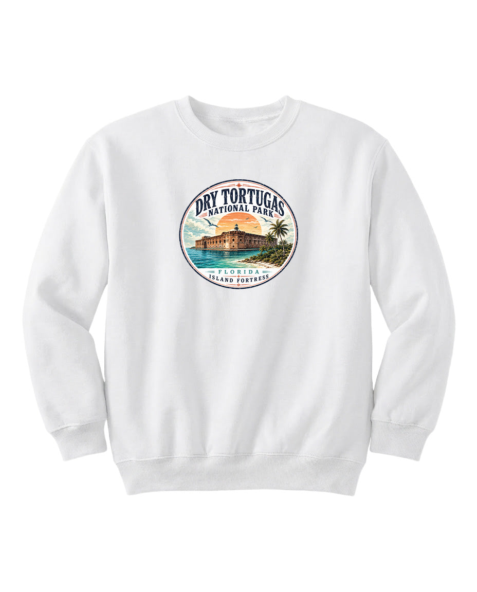 A white sweatshirt with a circular logo featuring a tropical island and palm trees, along with the text "Dry Tortugas National Park, Florida Island".