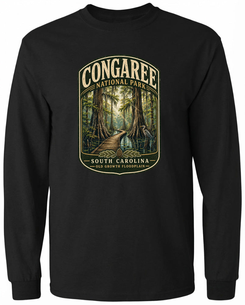 A black long-sleeved t-shirt with a graphic design depicting a forest scene with a winding path leading through the trees.
