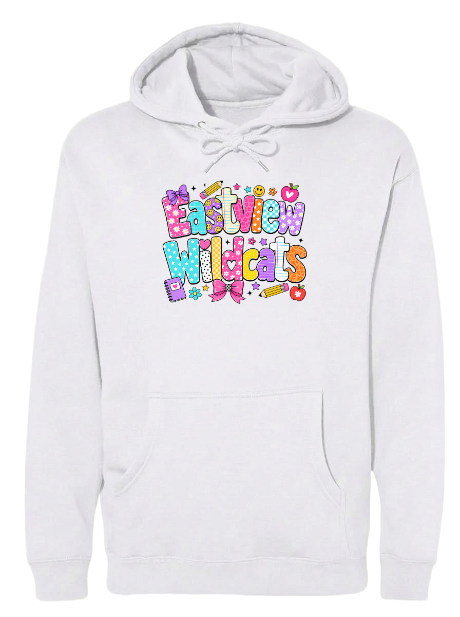 A white hoodie with a colorful graphic design featuring the text "Eastview Wildcats" and various decorative elements such as hearts, stars, and flowers.