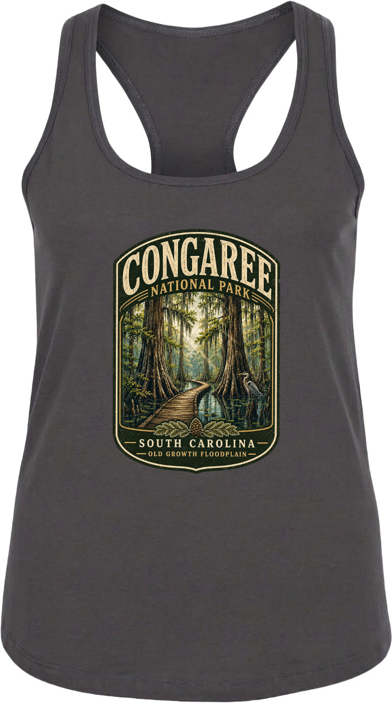 A gray tank top with a graphic design depicting a forest scene, featuring a path leading through the trees and the text "CONGAREE NATIONAL PARK SOUTH CAROLINA OLD GROWTH FLOODPLAIN".