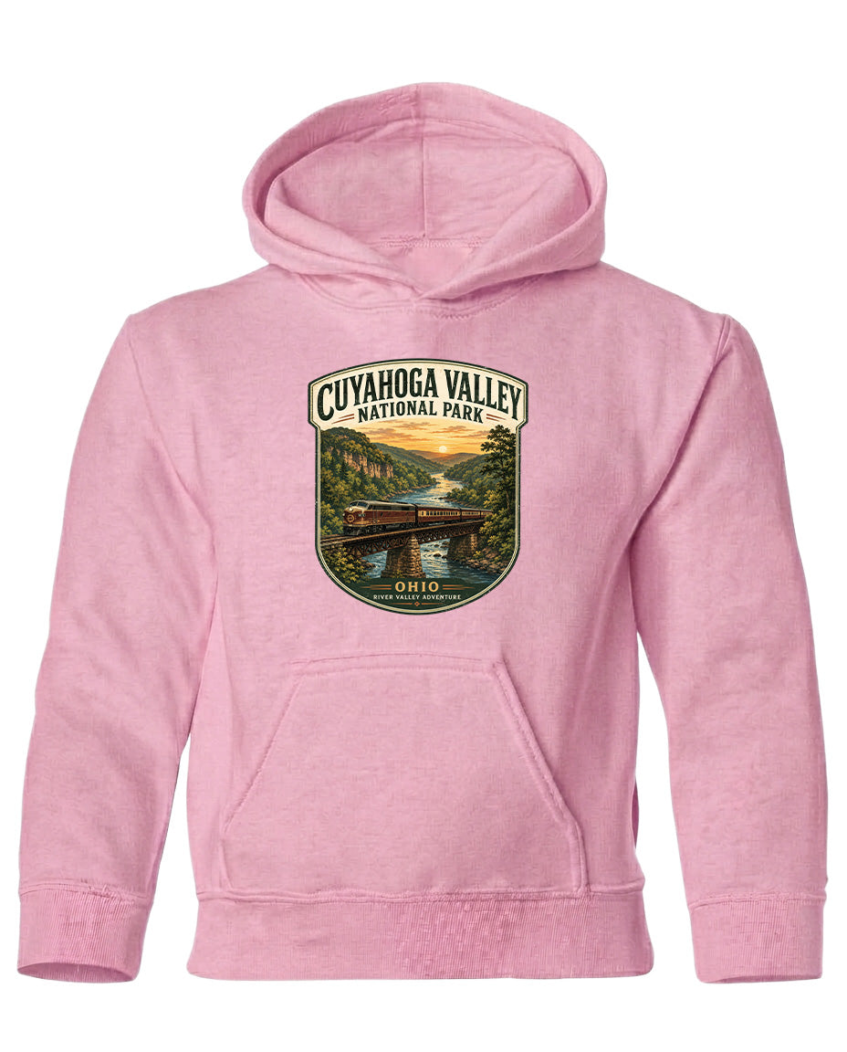 A pink hoodie with a graphic design depicting a scenic view of Cuyahoga Valley National Park, featuring a bridge and a river.