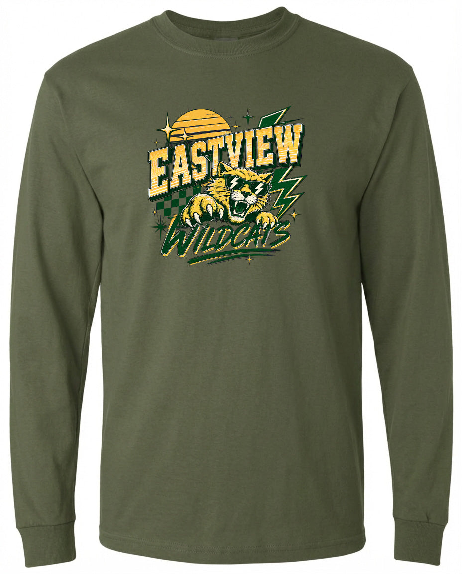 A long-sleeved olive green t-shirt with a graphic design featuring a yellow sun, green lightning bolts, and a cartoon-like wildcat.