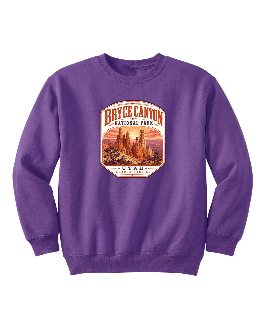 A purple sweatshirt with a graphic design featuring the Bryce Canyon National Park in Utah.