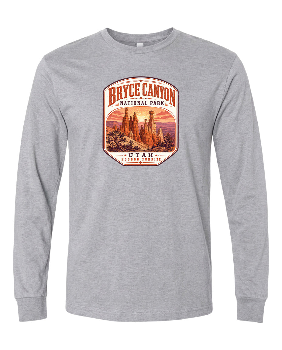 A gray long-sleeved t-shirt with a graphic design depicting the Bryce Canyon National Park in Utah.