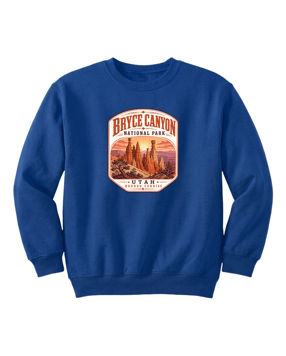 A blue sweatshirt with a graphic design depicting the Bryce Canyon National Park in Utah.