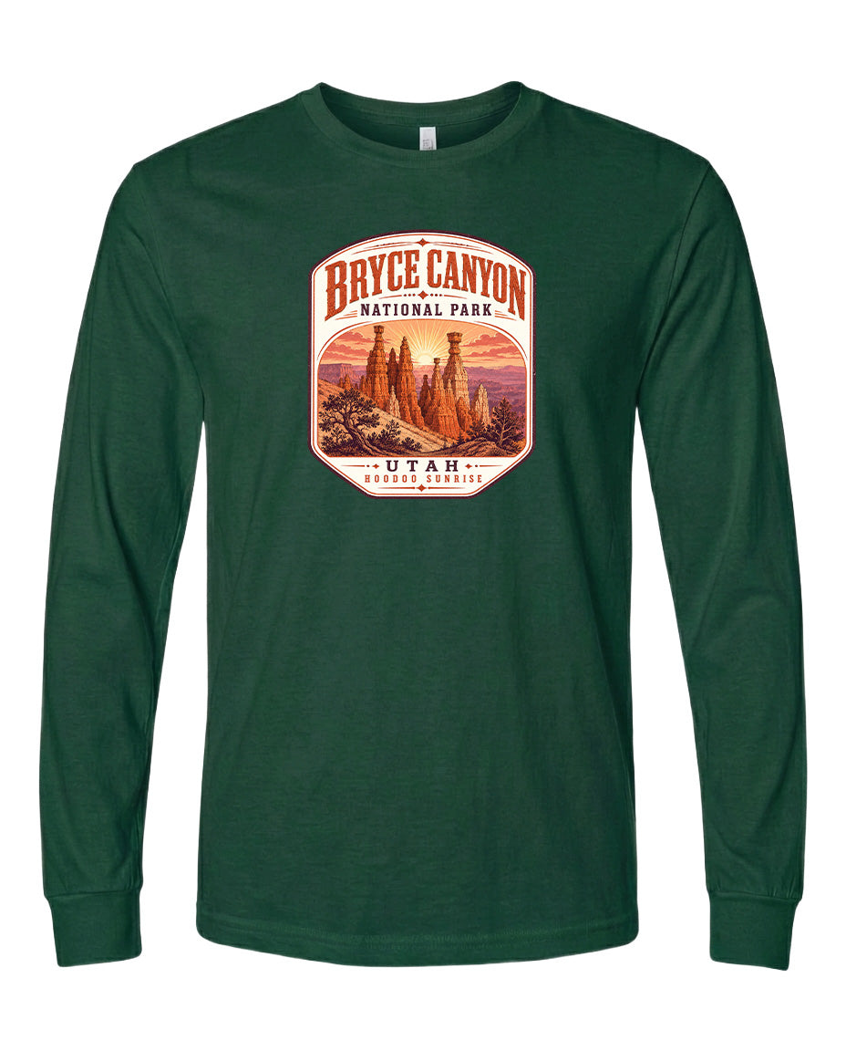 A green long-sleeved t-shirt with a graphic design depicting the Bryce Canyon National Park in Utah.