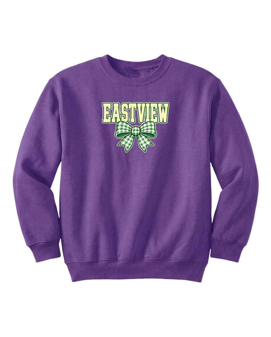 A purple sweatshirt with the text "EASTVIEW" and a green bow graphic printed on it.