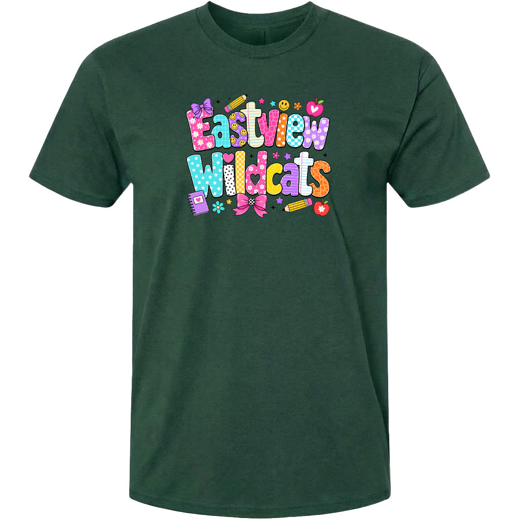A green t-shirt with a colorful graphic design featuring the text "Eastview Wildcats" and various decorative elements such as hearts, flowers, and stars.