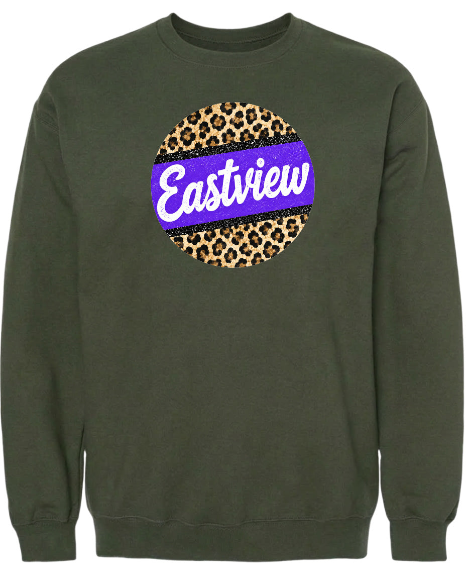 A dark green sweatshirt with a large circular logo on the front. The logo features a leopard print design with a purple border and the word "Eastview" written in white cursive text.