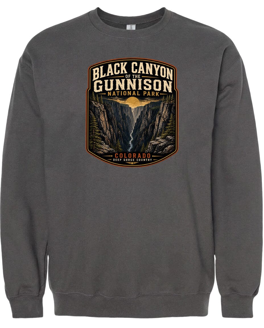 A gray sweatshirt with a graphic design depicting the Black Canyon of the Gunnison National Park in Colorado.