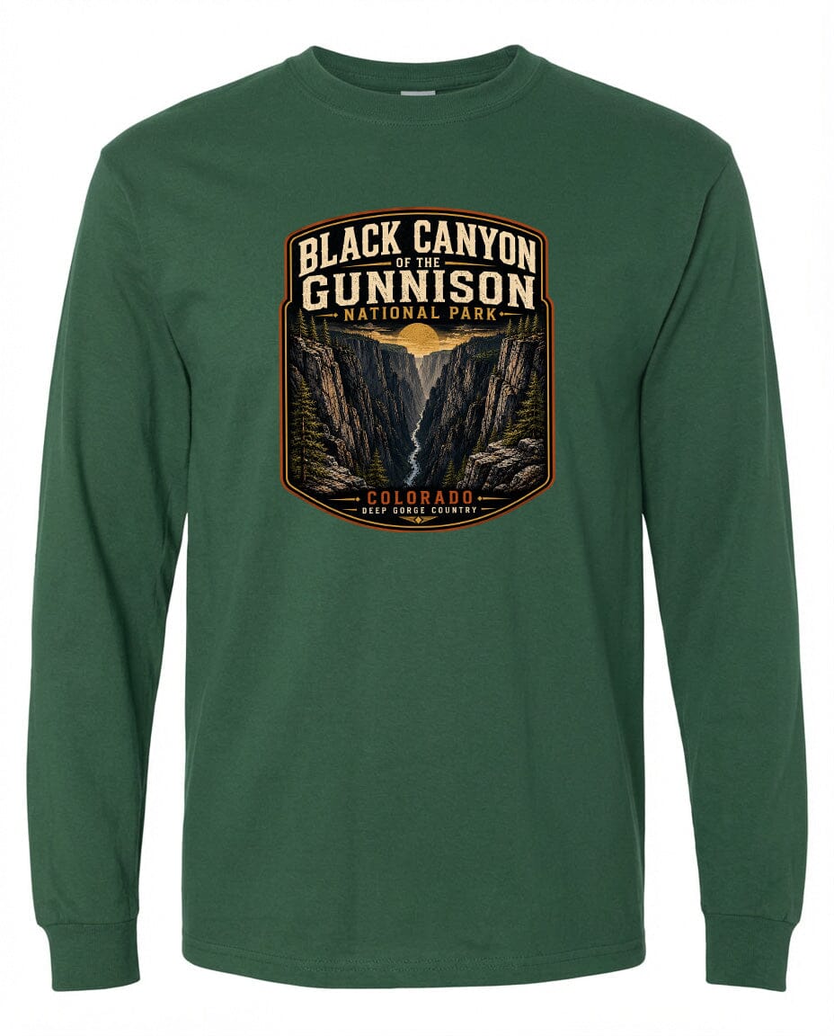 A green long-sleeved t-shirt with a graphic design depicting the Black Canyon of the Gunnison National Park in Colorado.