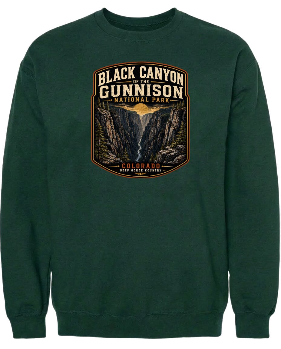A green sweatshirt with a graphic design depicting the Black Canyon of the Gunnison National Park in Colorado.
