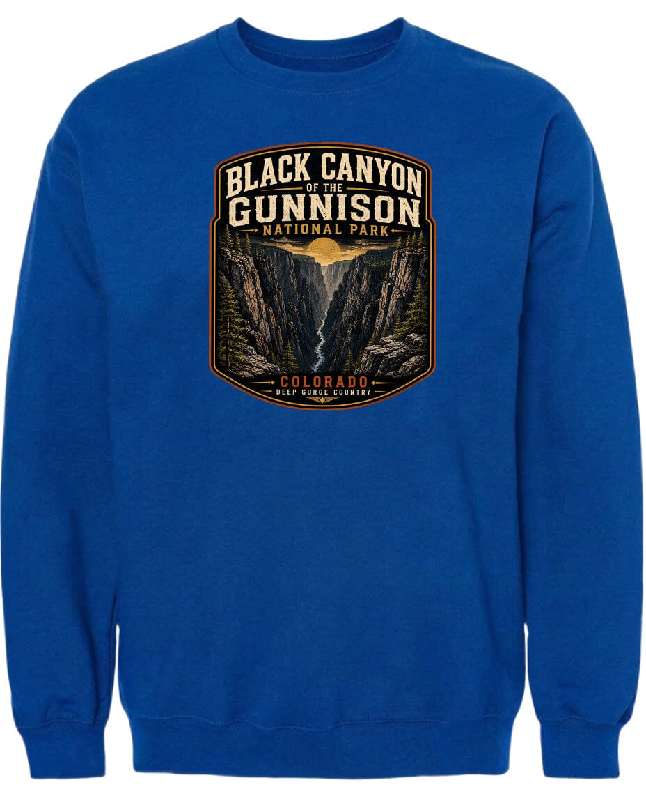 A blue sweatshirt with a graphic design depicting the Black Canyon of the Gunnison National Park in Colorado.