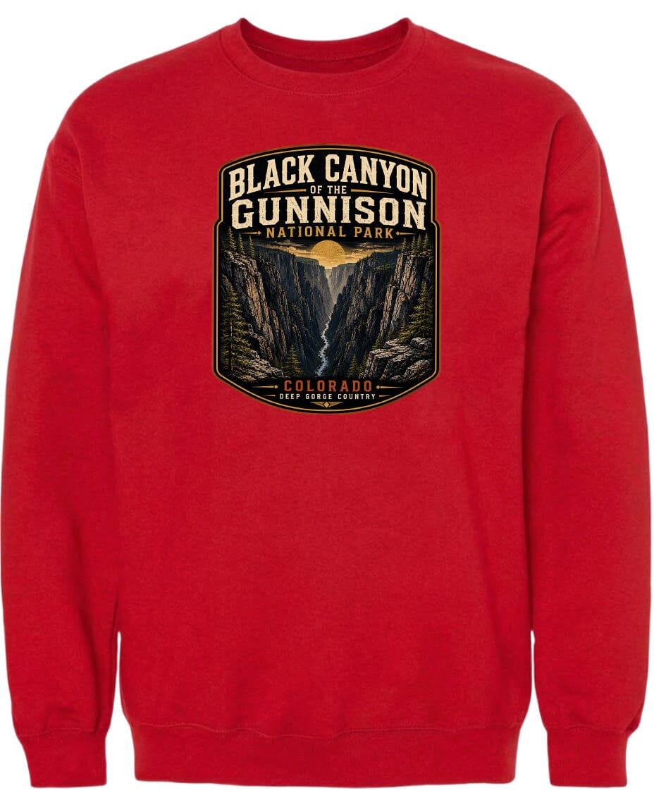 A red sweatshirt with a graphic design depicting the Black Canyon of the Gunnison National Park in Colorado.