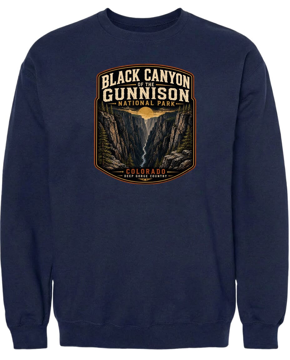 A navy blue sweatshirt with a graphic design depicting the Black Canyon of the Gunnison National Park in Colorado.