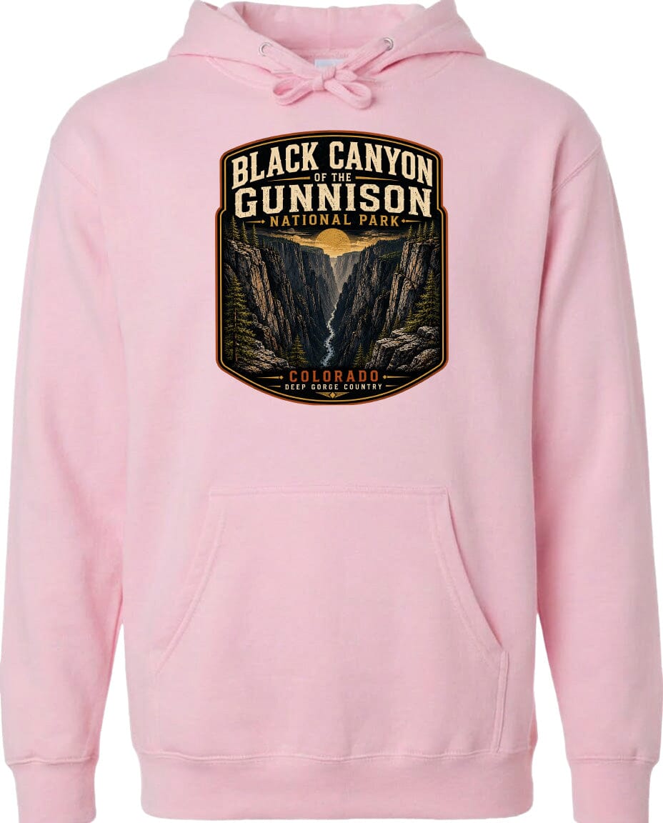 A pink hoodie with a graphic design depicting the Black Canyon of the Gunnison National Park in Colorado.