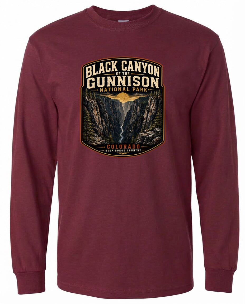 A long-sleeved burgundy t-shirt with a graphic design depicting the Black Canyon of the Gunnison National Park in Colorado.