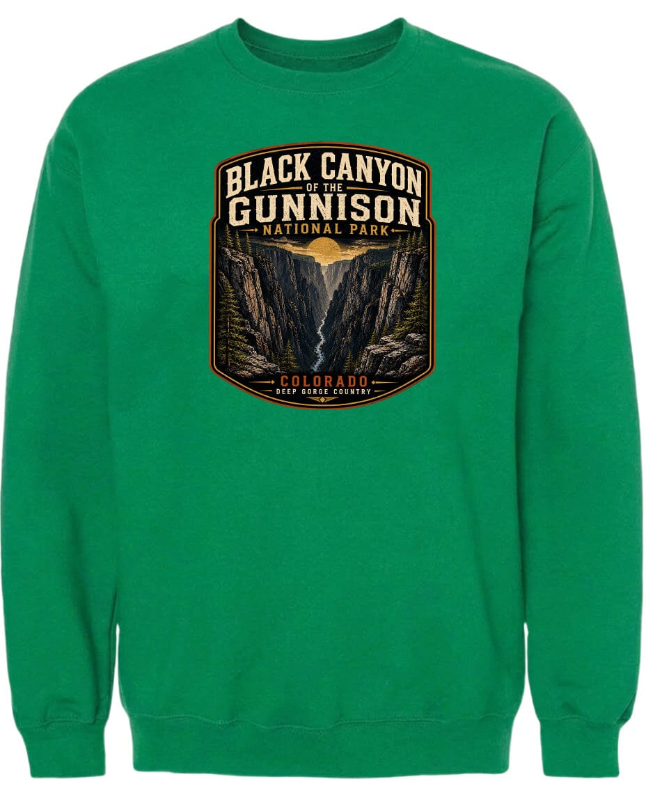 A green sweatshirt with a graphic design depicting the Black Canyon of the Gunnison National Park in Colorado.
