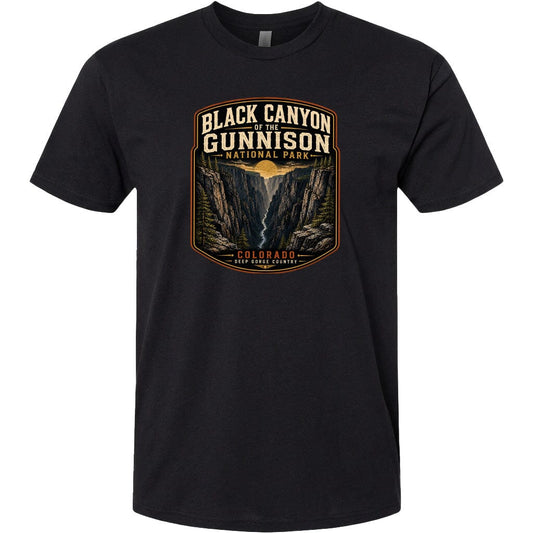 A black t-shirt with a graphic design depicting the Black Canyon of the Gunnison National Park in Colorado.