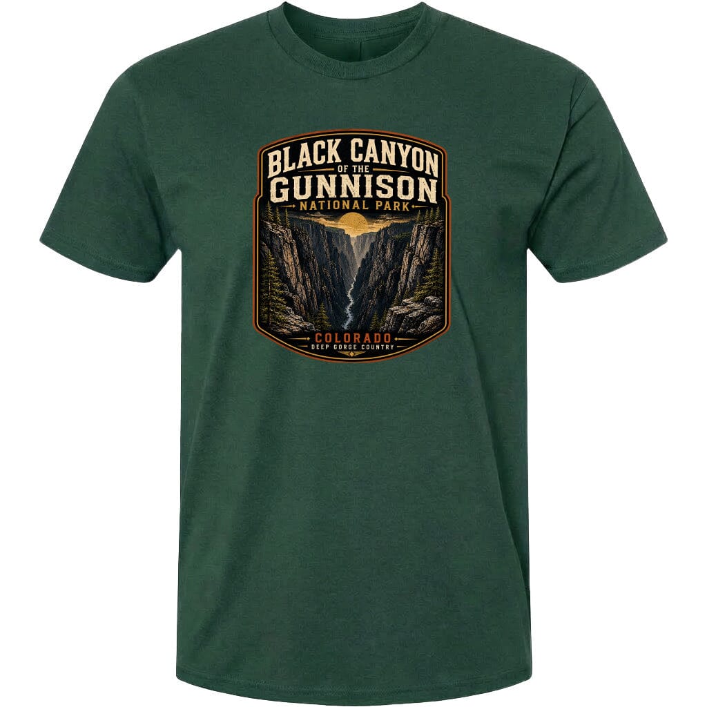 A green t-shirt with a graphic design depicting the Black Canyon of the Gunnison National Park in Colorado.