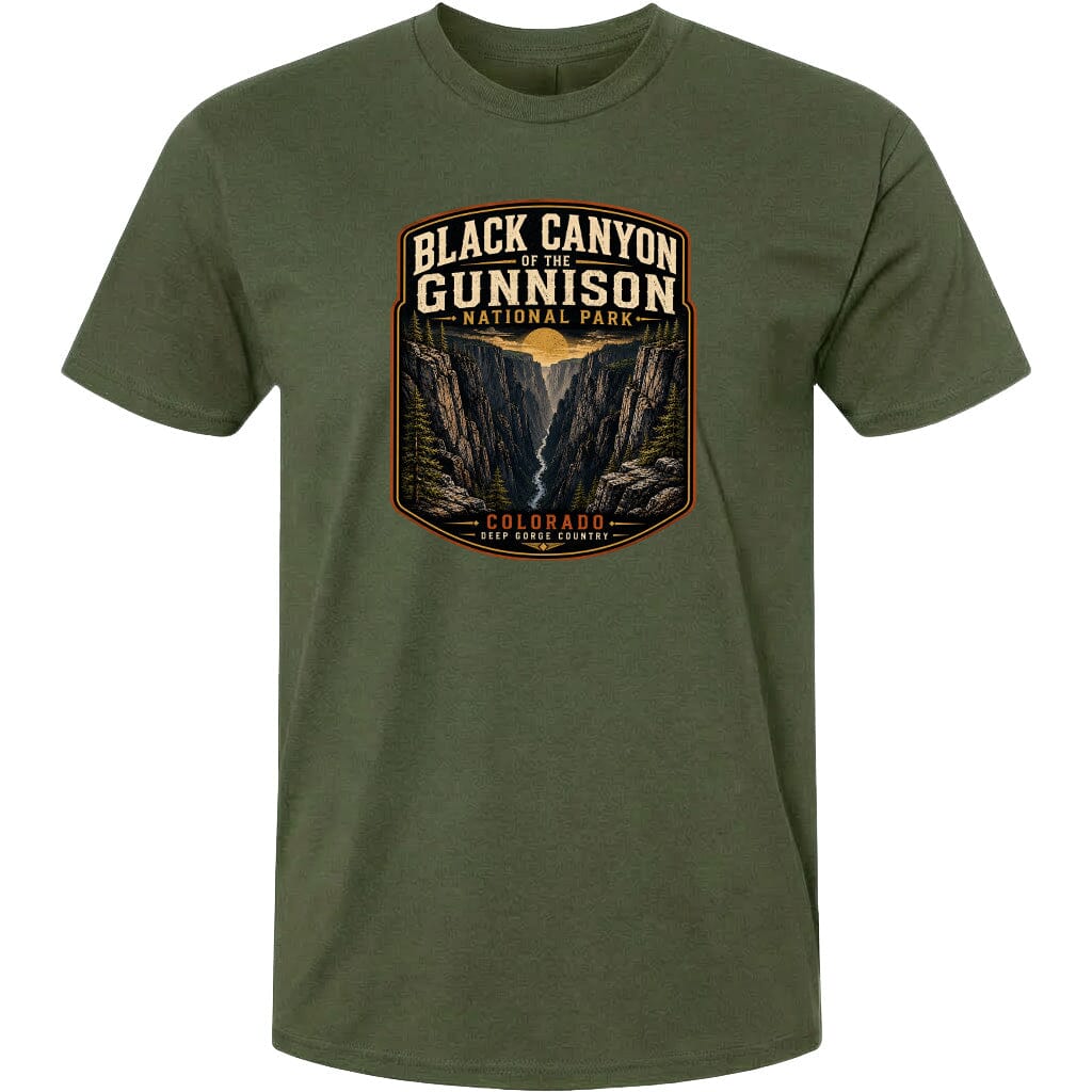 A green t-shirt with a graphic design depicting the Black Canyon of the Gunnison National Park in Colorado.