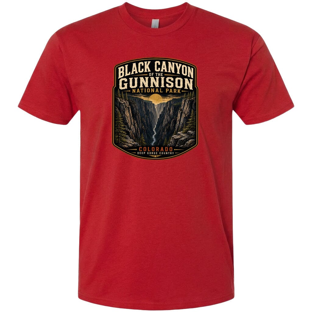 A red t-shirt with a graphic design depicting the Black Canyon of the Gunnison National Park in Colorado.