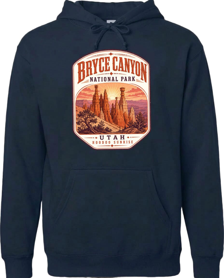 A navy blue hoodie with a graphic design depicting Bryce Canyon National Park and Utah, featuring a sunrise over the canyon.