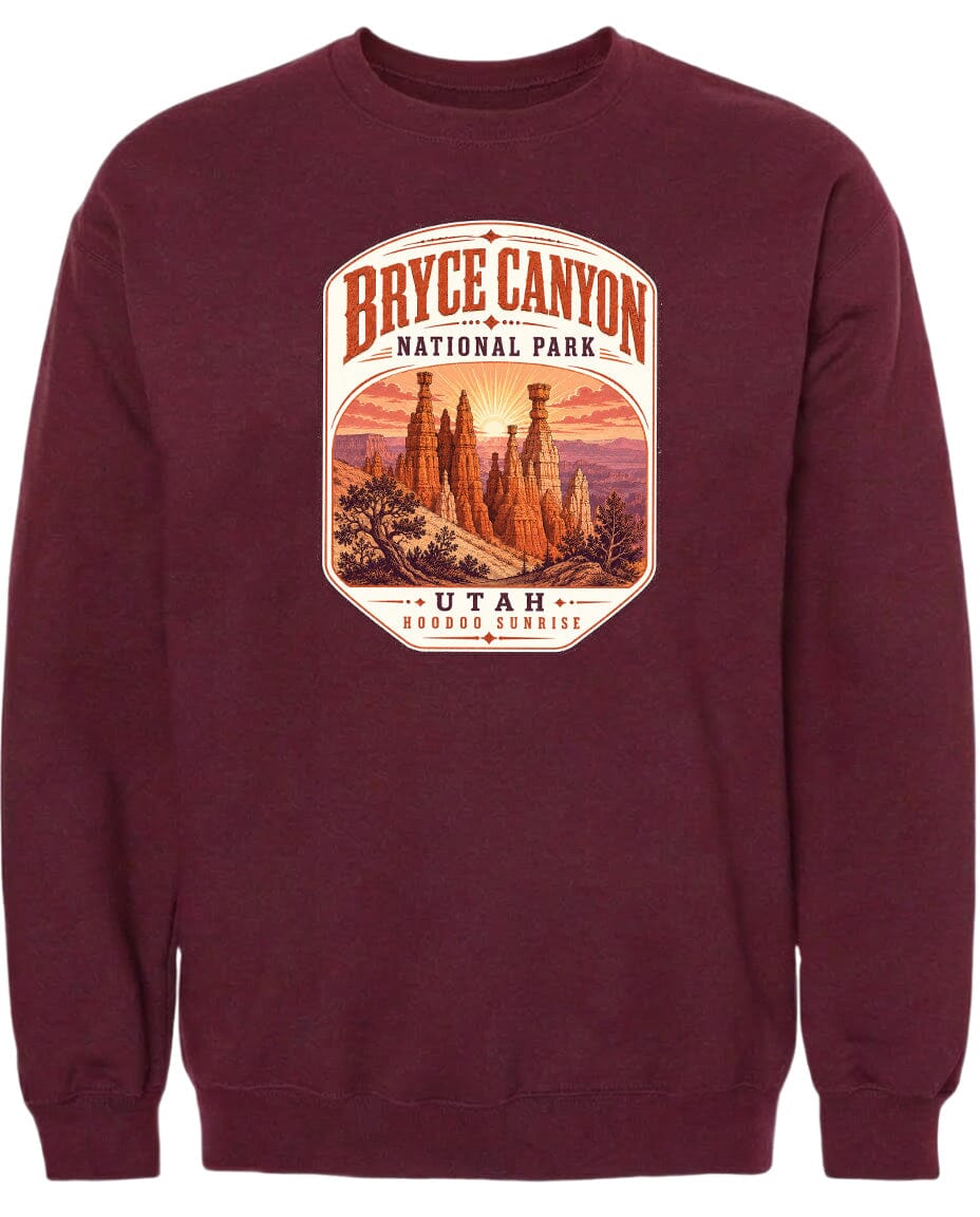 A burgundy-colored sweatshirt with a graphic design depicting the Bryce Canyon National Park in Utah.